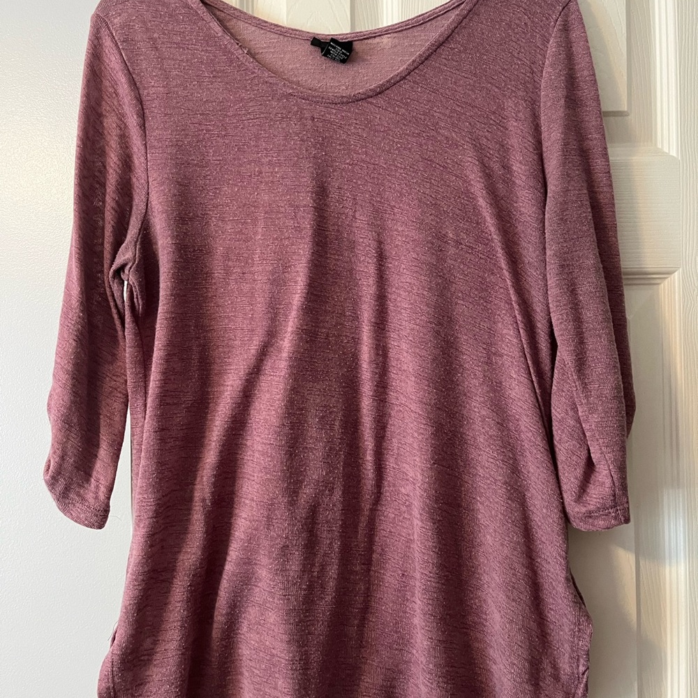 3/4 sleeve on a plum color casual shirt